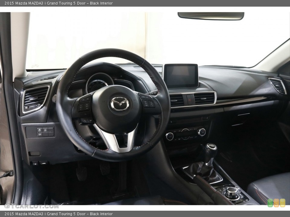 Black Interior Dashboard for the 2015 Mazda MAZDA3 i Grand Touring 5 Door #145592415