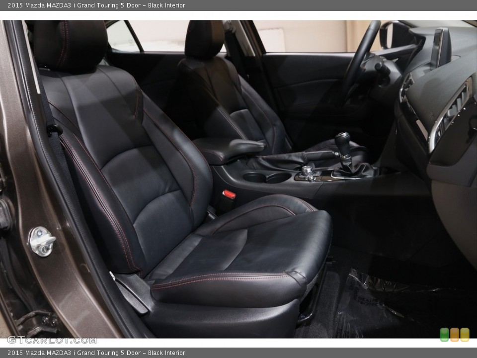 Black Interior Front Seat for the 2015 Mazda MAZDA3 i Grand Touring 5 Door #145592640