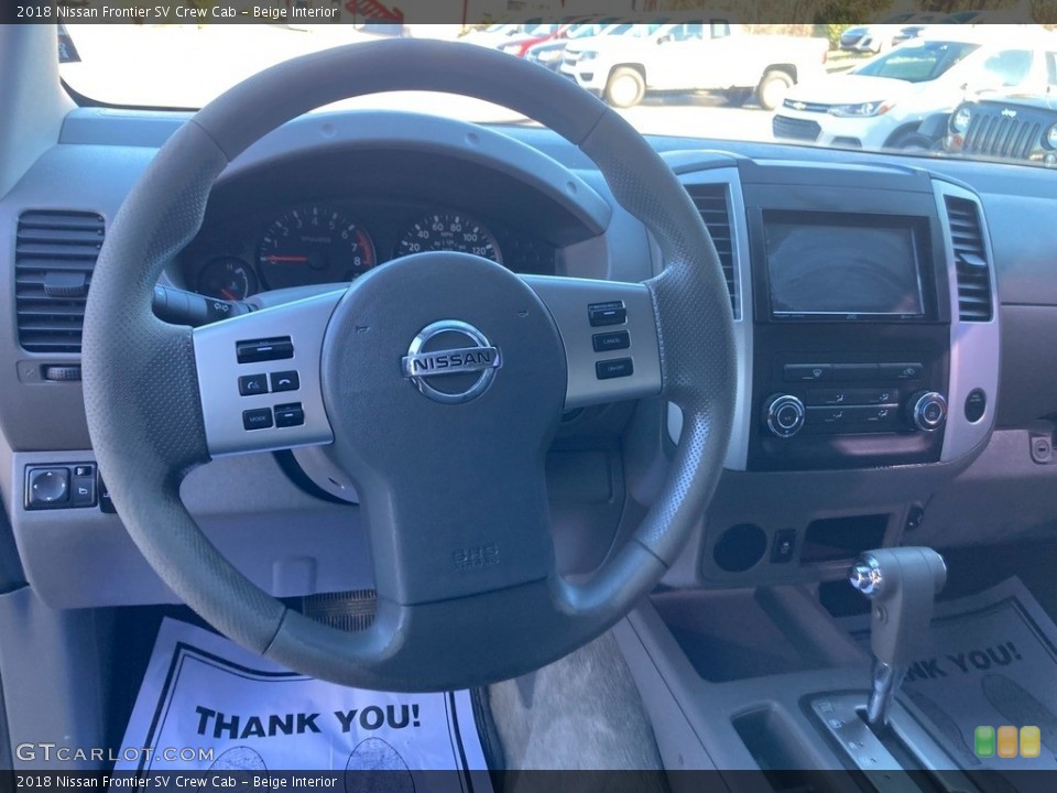 Beige Interior Steering Wheel for the 2018 Nissan Frontier SV Crew Cab #145620948