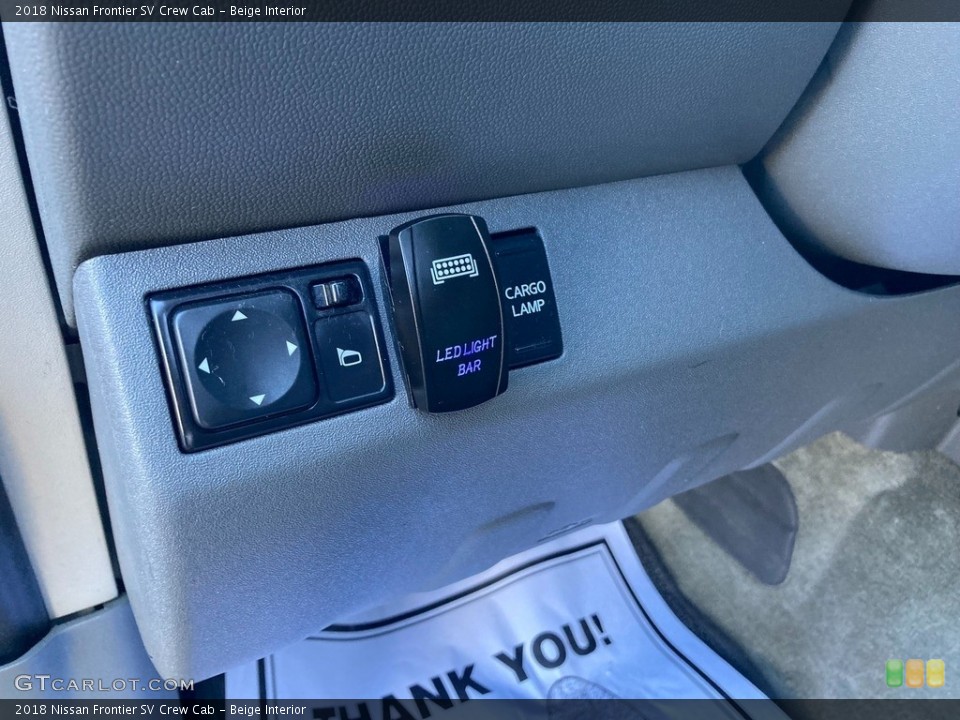 Beige Interior Controls for the 2018 Nissan Frontier SV Crew Cab #145620957