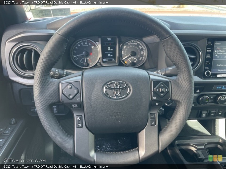 Black/Cement Interior Steering Wheel for the 2023 Toyota Tacoma TRD Off Road Double Cab 4x4 #145622261