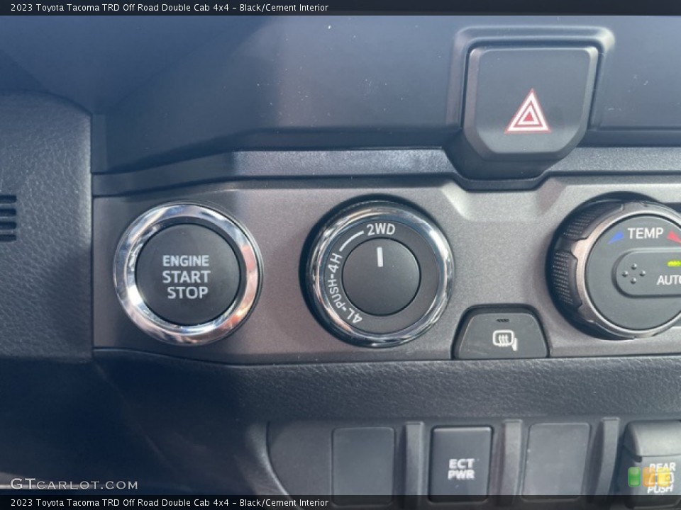 Black/Cement Interior Controls for the 2023 Toyota Tacoma TRD Off Road Double Cab 4x4 #145622321