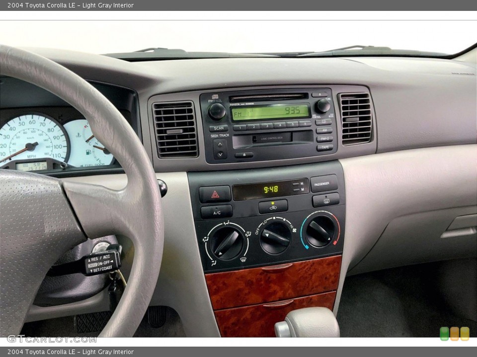 Light Gray Interior Controls for the 2004 Toyota Corolla LE #145630571