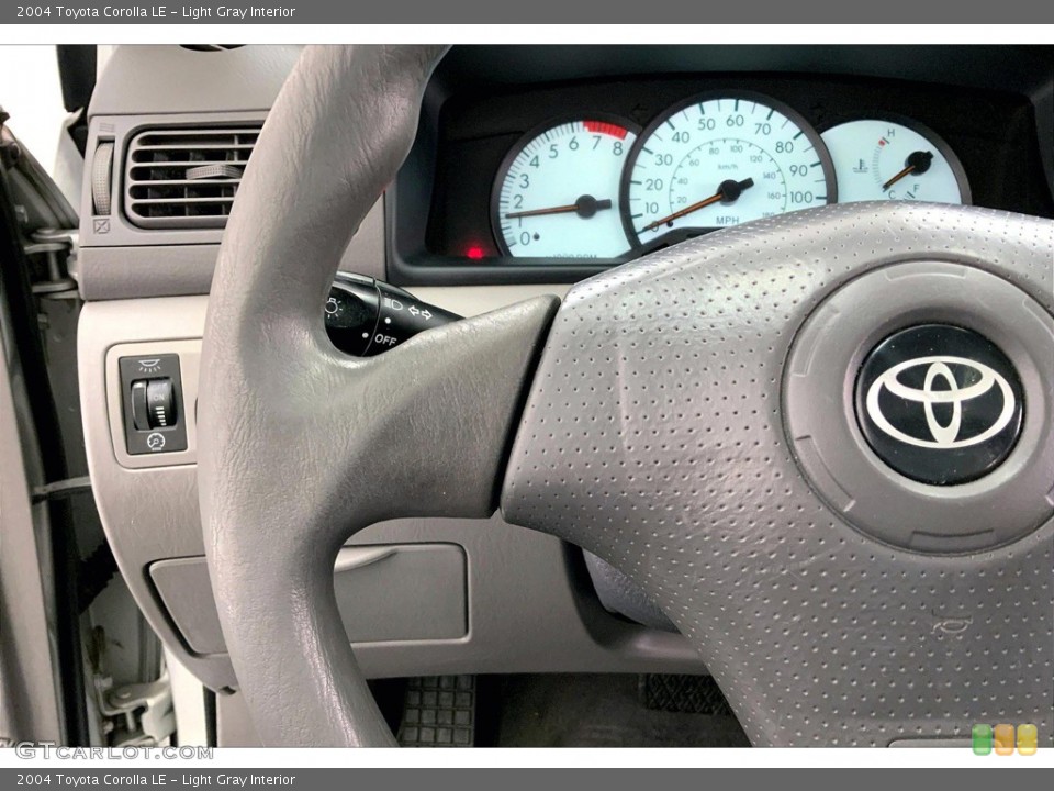 Light Gray Interior Steering Wheel for the 2004 Toyota Corolla LE #145630988