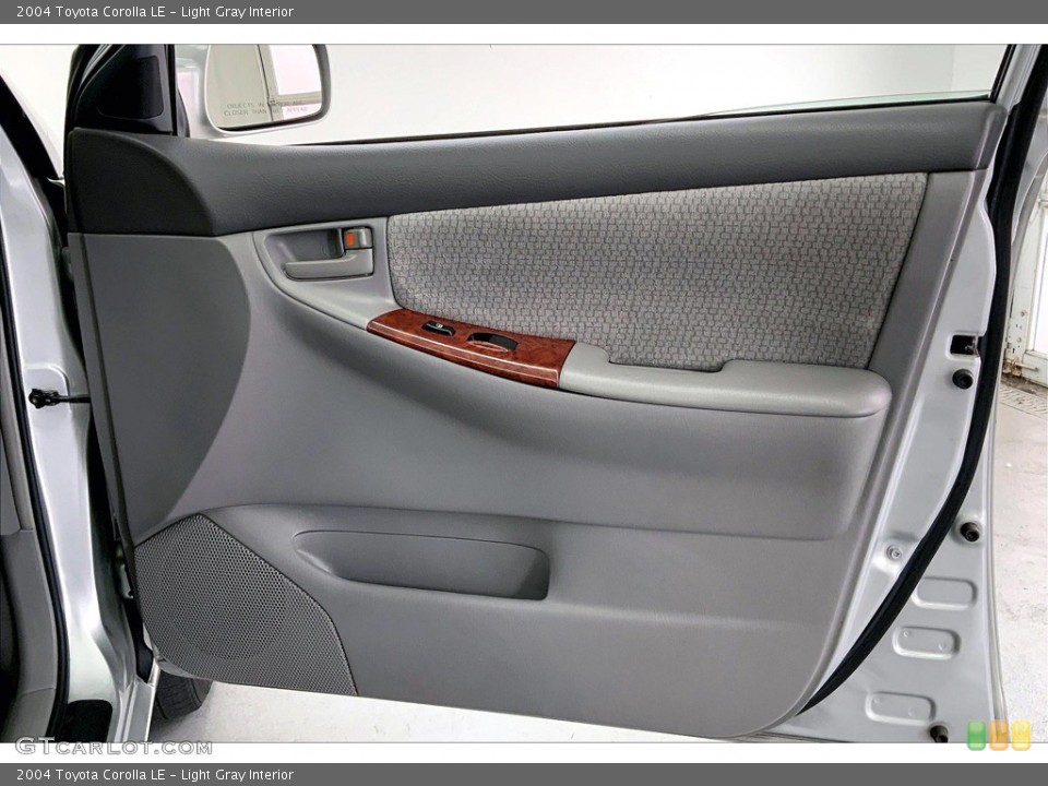 Light Gray Interior Door Panel for the 2004 Toyota Corolla LE #145631138