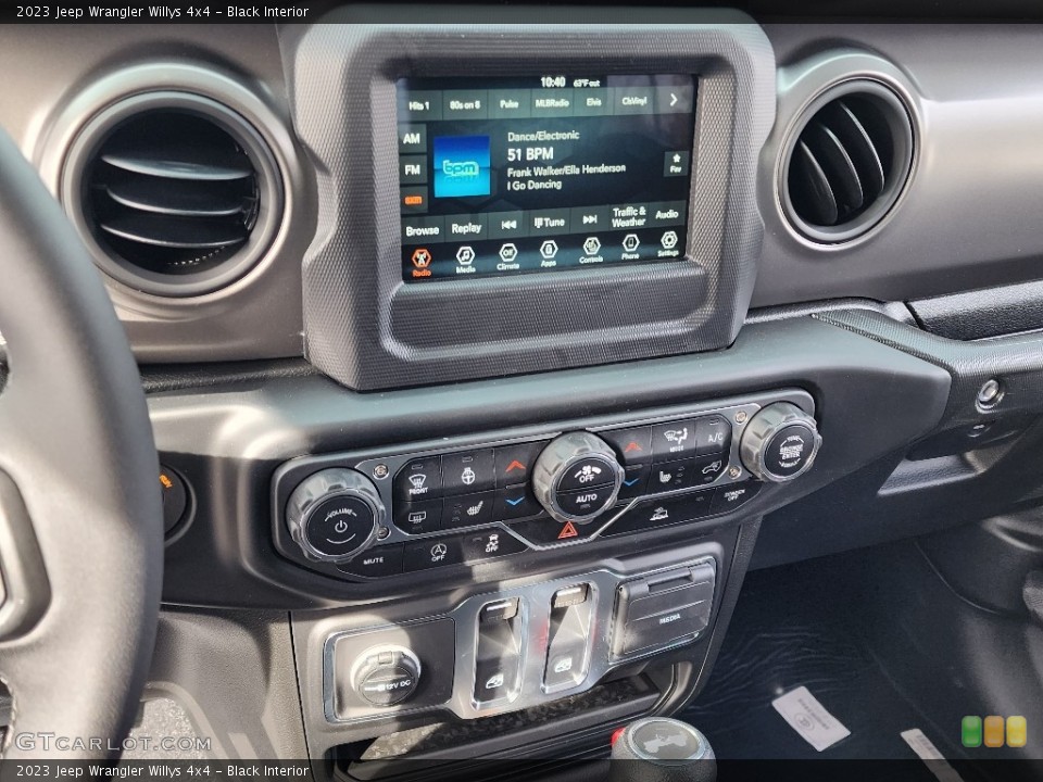 Black Interior Controls for the 2023 Jeep Wrangler Willys 4x4 #145644579