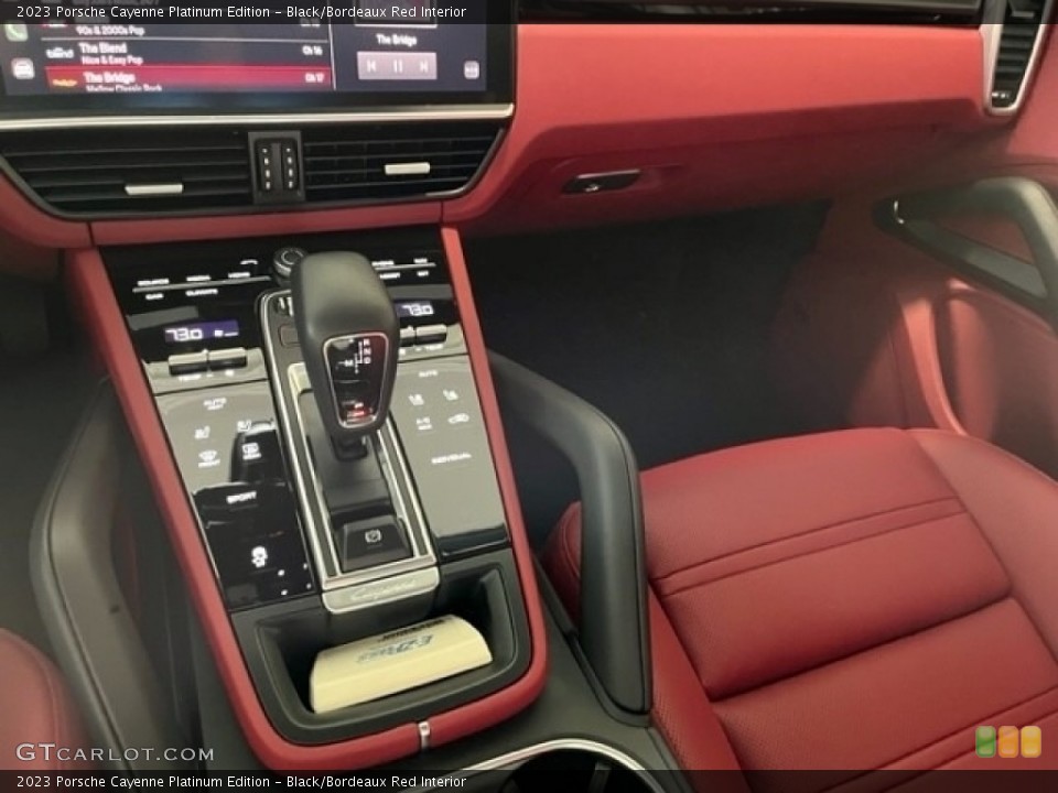 Black/Bordeaux Red Interior Controls for the 2023 Porsche Cayenne Platinum Edition #145691537