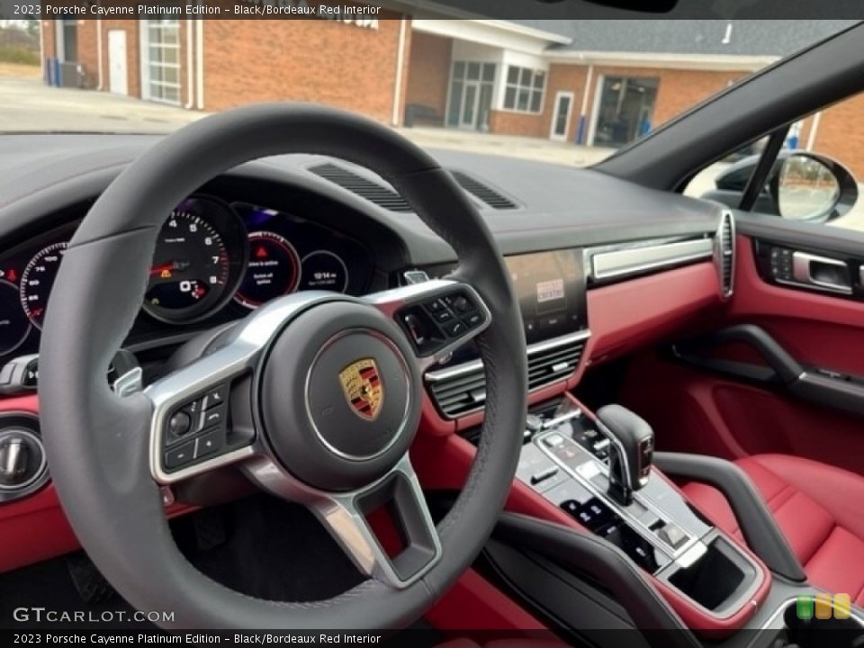 Black/Bordeaux Red Interior Steering Wheel for the 2023 Porsche Cayenne Platinum Edition #145691738