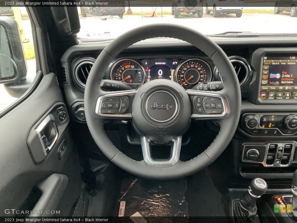 Black Interior Steering Wheel for the 2023 Jeep Wrangler Unlimited Sahara 4x4 #145726816