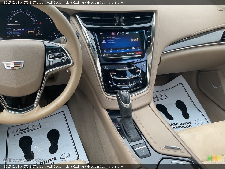 Light Cashmere/Medium Cashmere Interior Controls for the 2015 Cadillac CTS 2.0T Luxury AWD Sedan #145732290