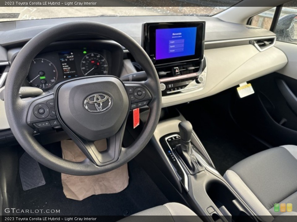 Light Gray Interior Dashboard for the 2023 Toyota Corolla LE Hybrid #145779810