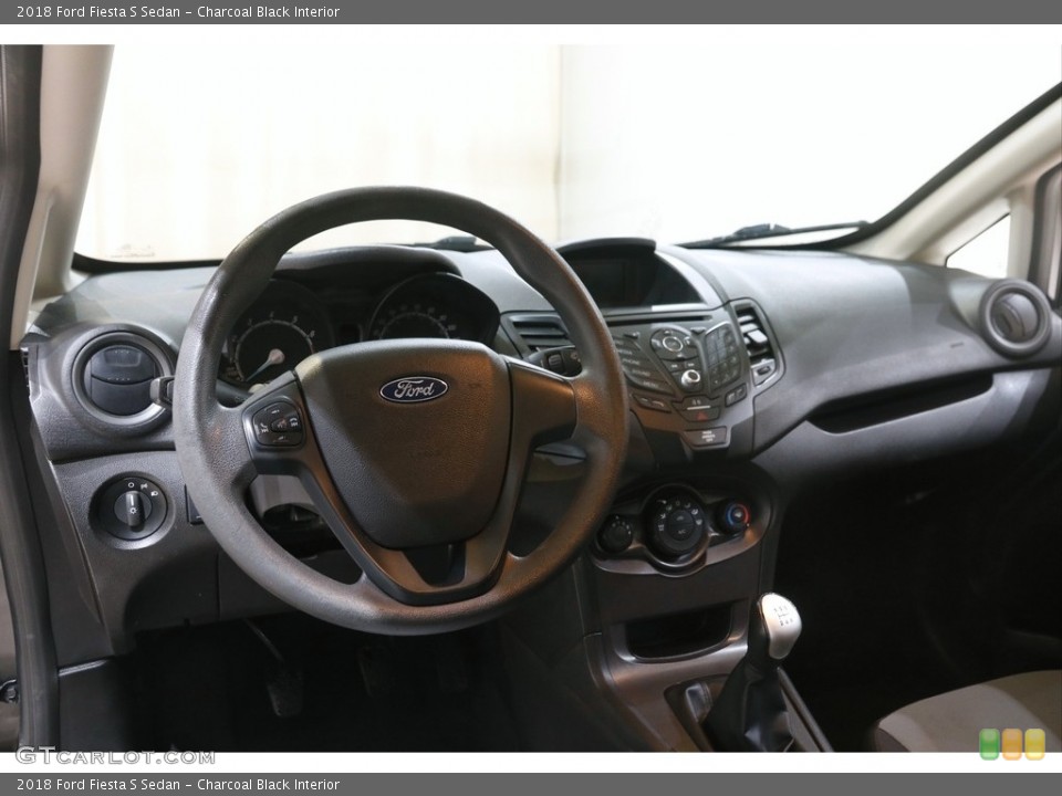 Charcoal Black Interior Dashboard for the 2018 Ford Fiesta S Sedan #145798819