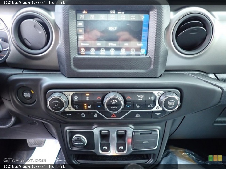 Black Interior Controls for the 2023 Jeep Wrangler Sport 4x4 #145841960