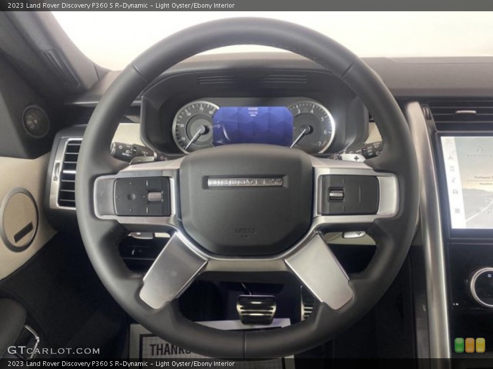Light Oyster/Ebony Interior Steering Wheel for the 2023 Land Rover Discovery P360 S R-Dynamic #145874339