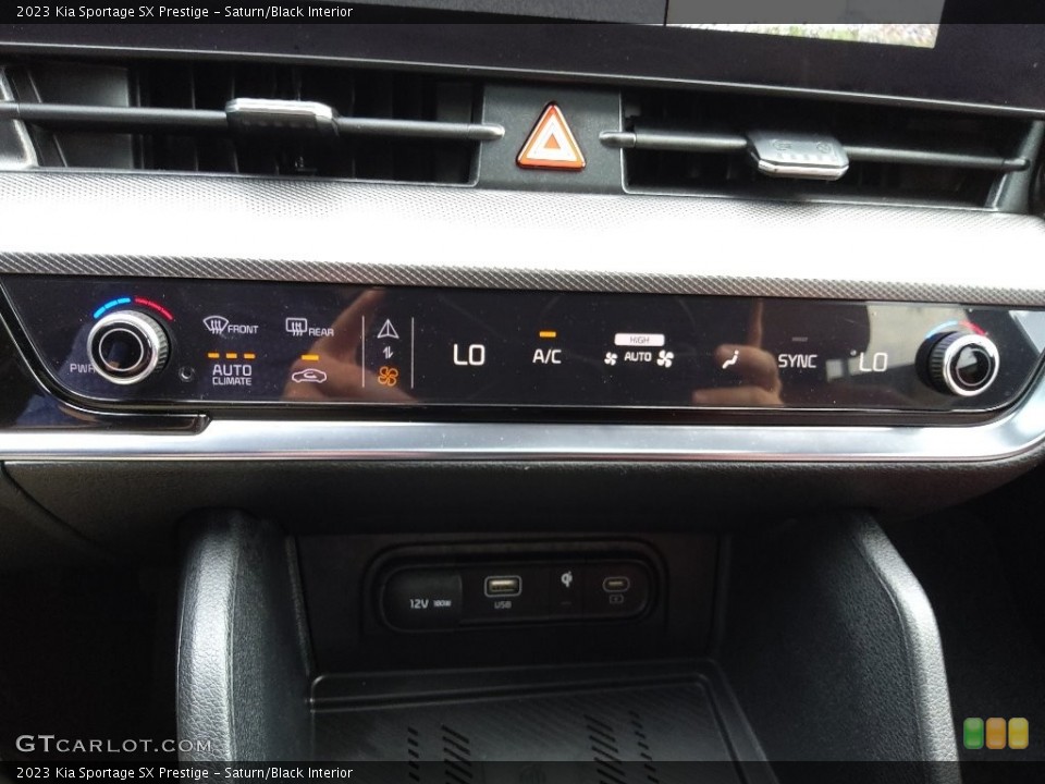 Saturn/Black Interior Controls for the 2023 Kia Sportage SX Prestige #145902801