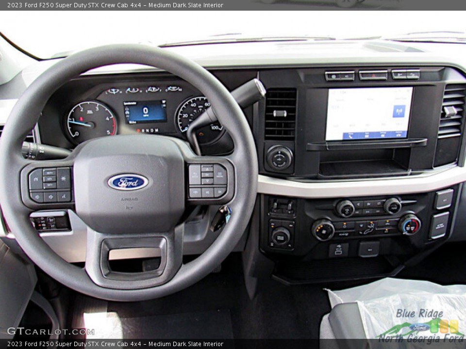 Medium Dark Slate Interior Dashboard for the 2023 Ford F250 Super Duty STX Crew Cab 4x4 #145998525