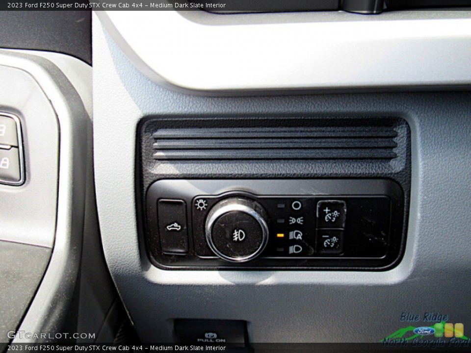 Medium Dark Slate Interior Controls for the 2023 Ford F250 Super Duty STX Crew Cab 4x4 #145998641