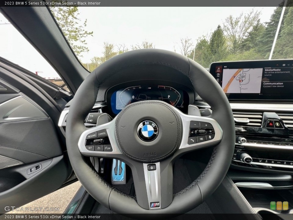 Black Interior Steering Wheel for the 2023 BMW 5 Series 530i xDrive Sedan #146013448