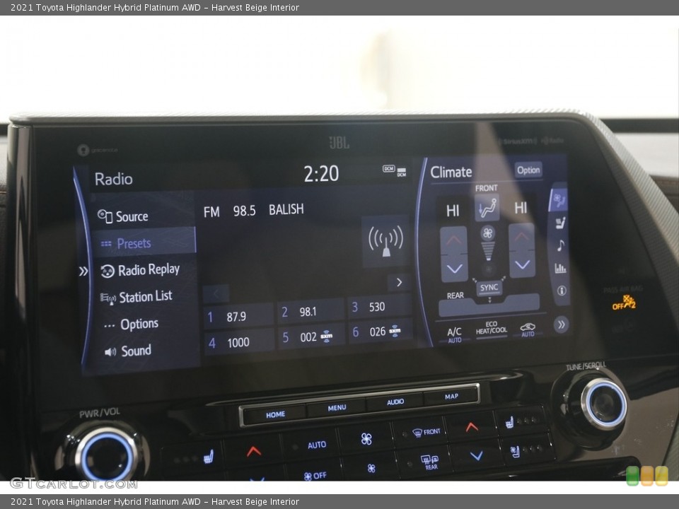 Harvest Beige Interior Controls for the 2021 Toyota Highlander Hybrid Platinum AWD #146015391