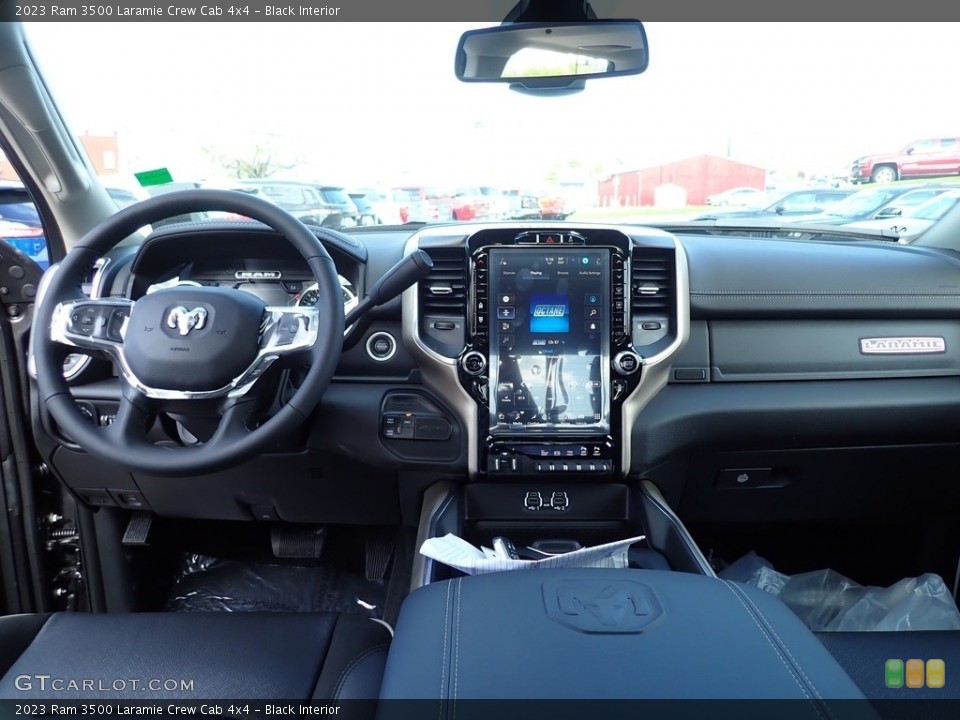 Black Interior Dashboard for the 2023 Ram 3500 Laramie Crew Cab 4x4 #146067101