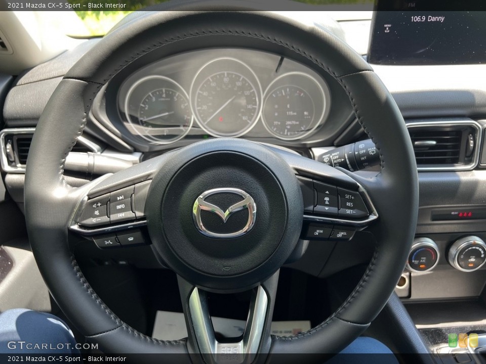 Black Interior Steering Wheel for the 2021 Mazda CX-5 Sport #146081208