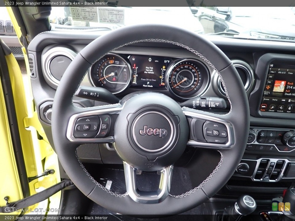 Black Interior Steering Wheel for the 2023 Jeep Wrangler Unlimited Sahara 4x4 #146086047