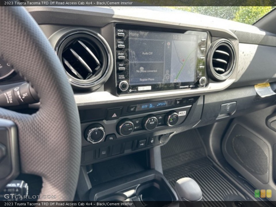 Black/Cement Interior Controls for the 2023 Toyota Tacoma TRD Off Road Access Cab 4x4 #146097219