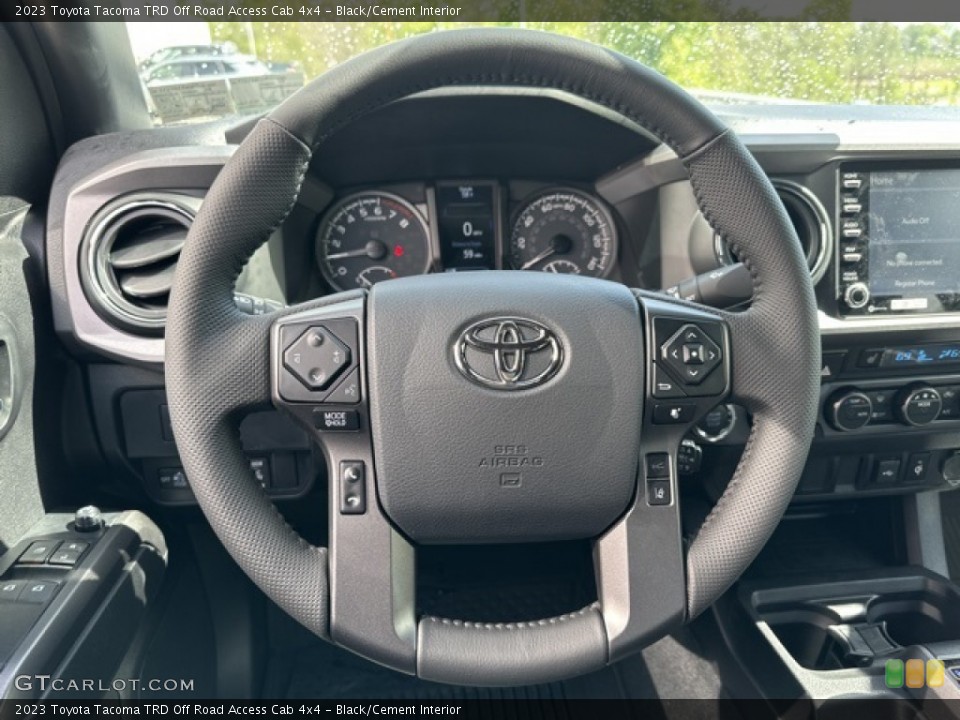 Black/Cement Interior Steering Wheel for the 2023 Toyota Tacoma TRD Off Road Access Cab 4x4 #146097234