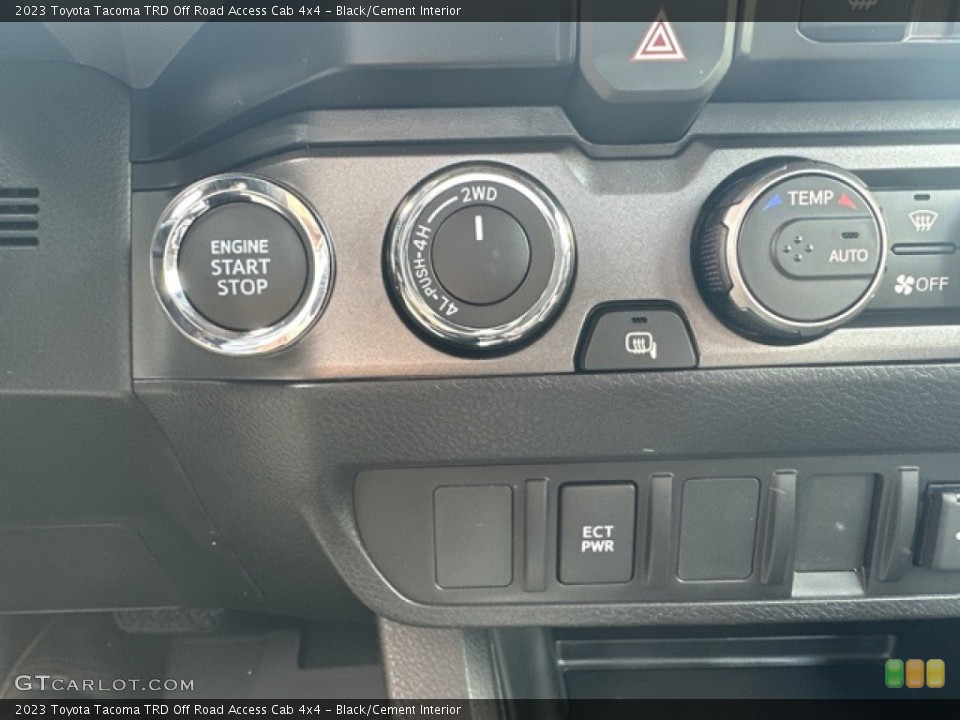 Black/Cement Interior Controls for the 2023 Toyota Tacoma TRD Off Road Access Cab 4x4 #146097246