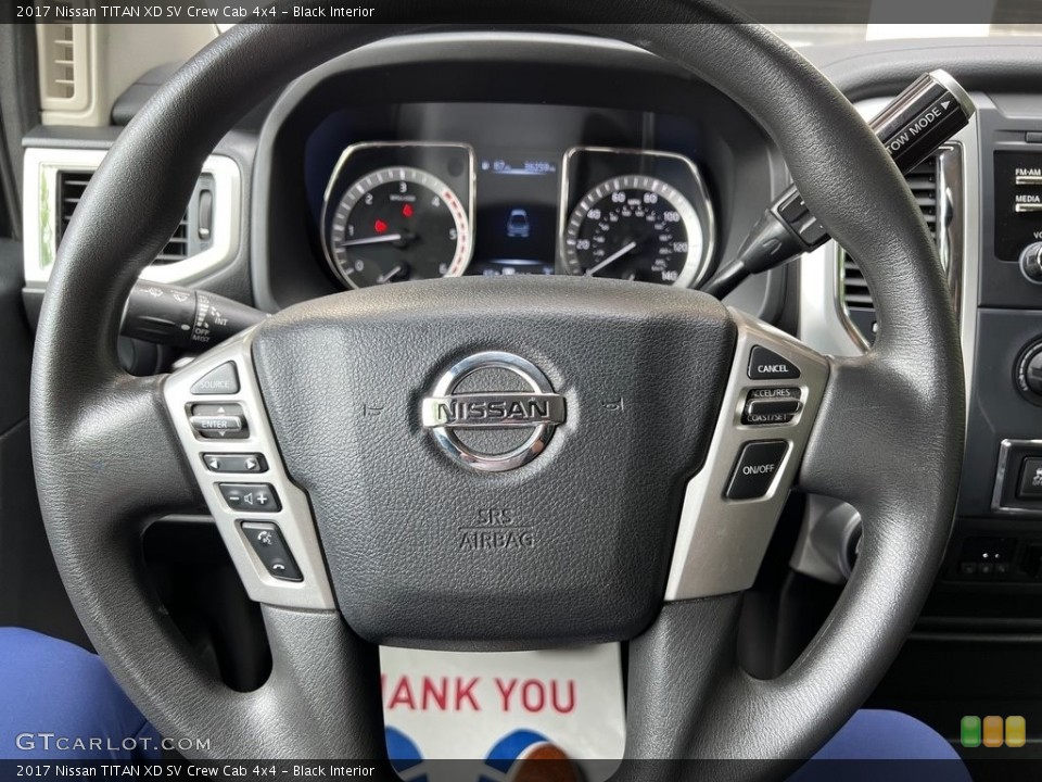 Black Interior Steering Wheel for the 2017 Nissan TITAN XD SV Crew Cab 4x4 #146111988