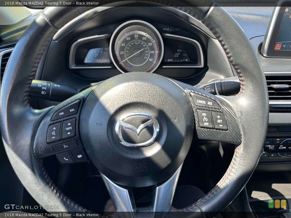Black Interior Steering Wheel for the 2018 Mazda MAZDA3 Touring 5 Door #146114123