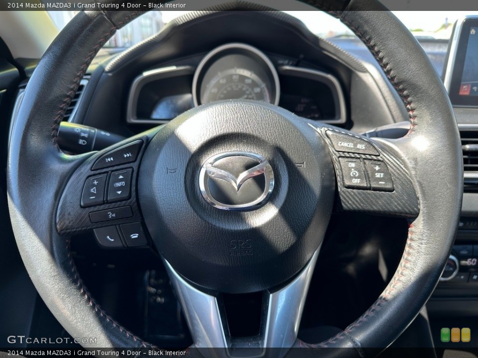 Black Interior Steering Wheel for the 2014 Mazda MAZDA3 i Grand Touring 4 Door #146129141