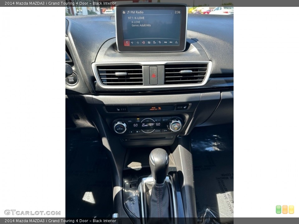 Black Interior Controls for the 2014 Mazda MAZDA3 i Grand Touring 4 Door #146129147