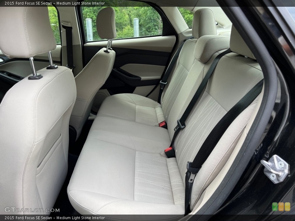 Medium Light Stone Interior Rear Seat for the 2015 Ford Focus SE Sedan #146148531