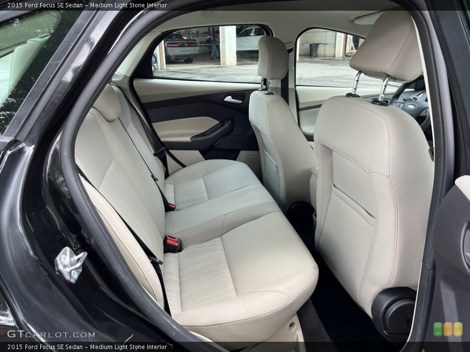 Medium Light Stone Interior Rear Seat for the 2015 Ford Focus SE Sedan #146148594