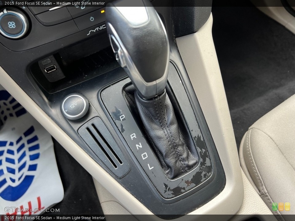 Medium Light Stone Interior Transmission for the 2015 Ford Focus SE Sedan #146148817