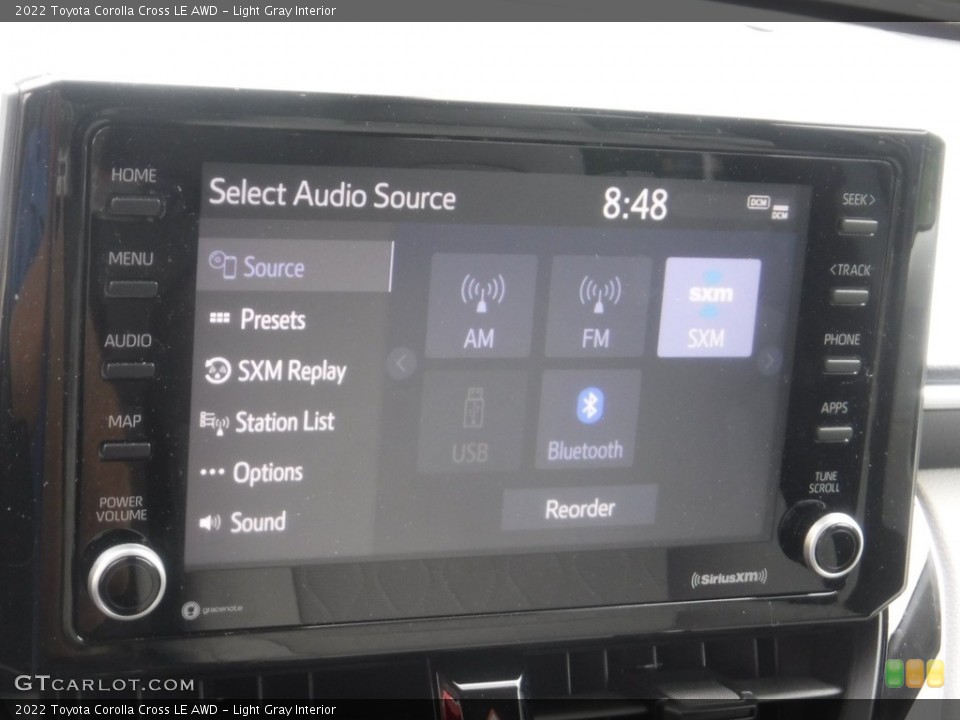 Light Gray Interior Controls for the 2022 Toyota Corolla Cross LE AWD #146175570
