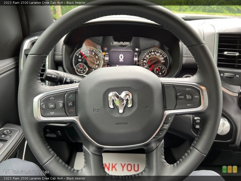 Black Interior Steering Wheel for the 2023 Ram 1500 Laramie Crew Cab 4x4 #146177708
