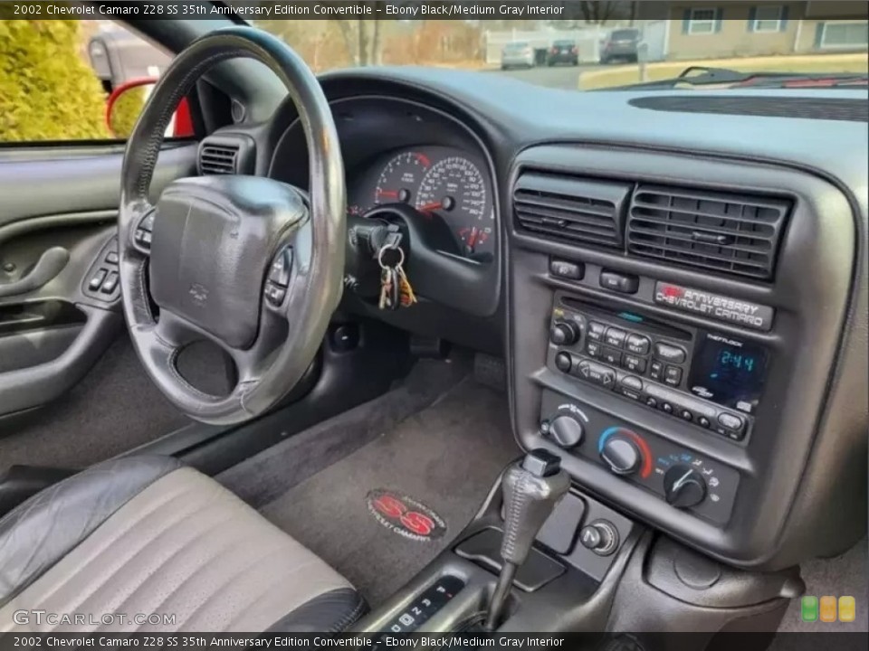 Ebony Black/Medium Gray Interior Controls for the 2002 Chevrolet Camaro Z28 SS 35th Anniversary Edition Convertible #146218272