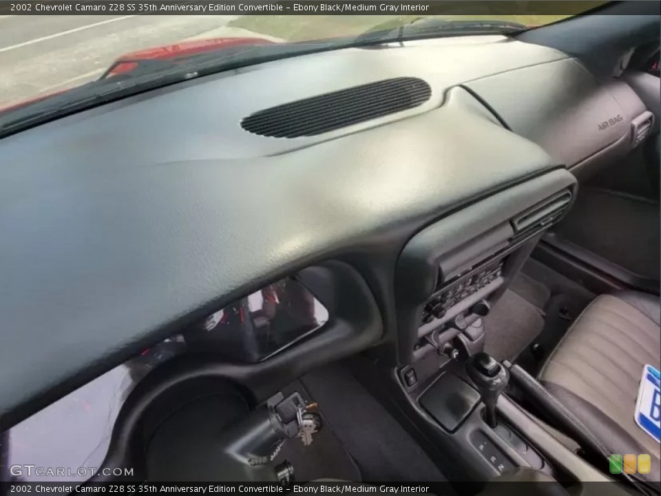 Ebony Black/Medium Gray Interior Dashboard for the 2002 Chevrolet Camaro Z28 SS 35th Anniversary Edition Convertible #146218491