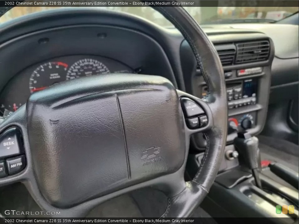 Ebony Black/Medium Gray Interior Steering Wheel for the 2002 Chevrolet Camaro Z28 SS 35th Anniversary Edition Convertible #146218512