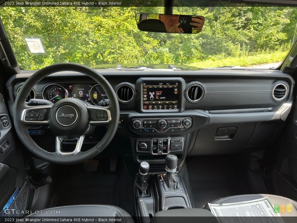 Black Interior Dashboard for the 2023 Jeep Wrangler Unlimited Sahara 4XE Hybrid #146271738