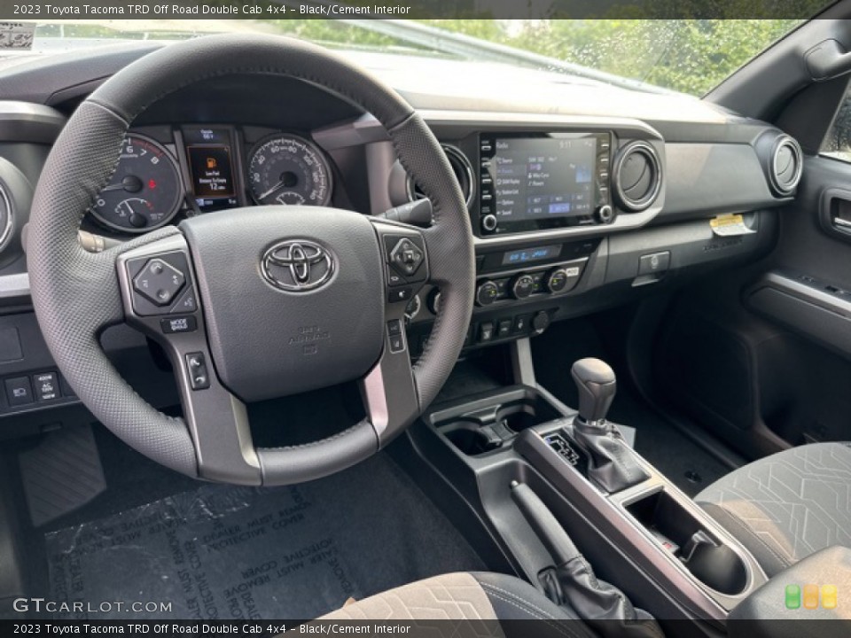 Black/Cement Interior Photo for the 2023 Toyota Tacoma TRD Off Road Double Cab 4x4 #146275373