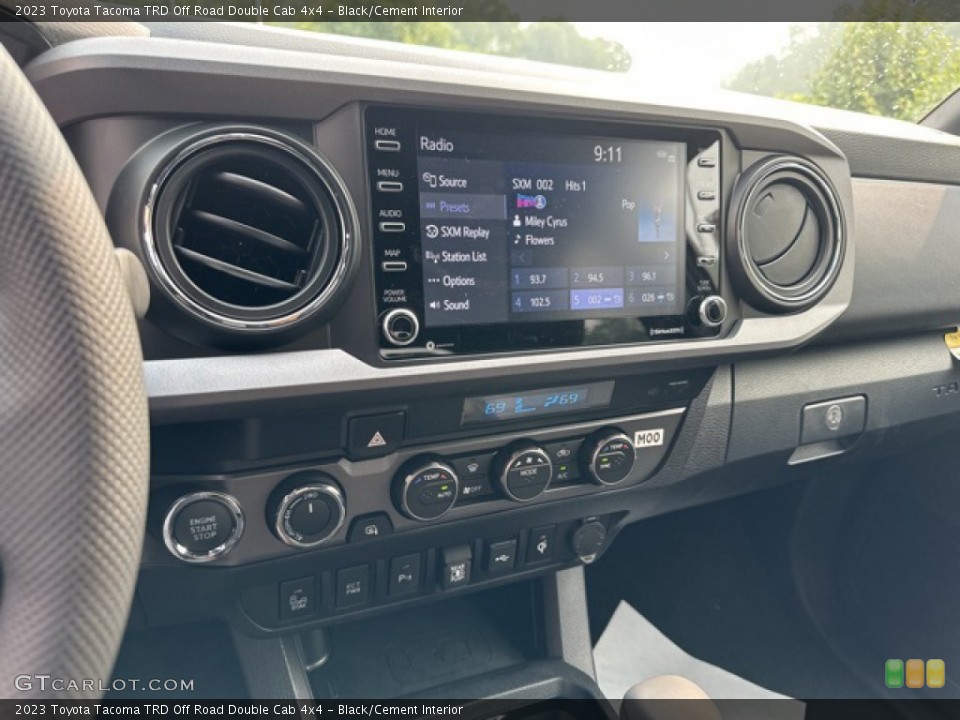 Black/Cement Interior Controls for the 2023 Toyota Tacoma TRD Off Road Double Cab 4x4 #146275390