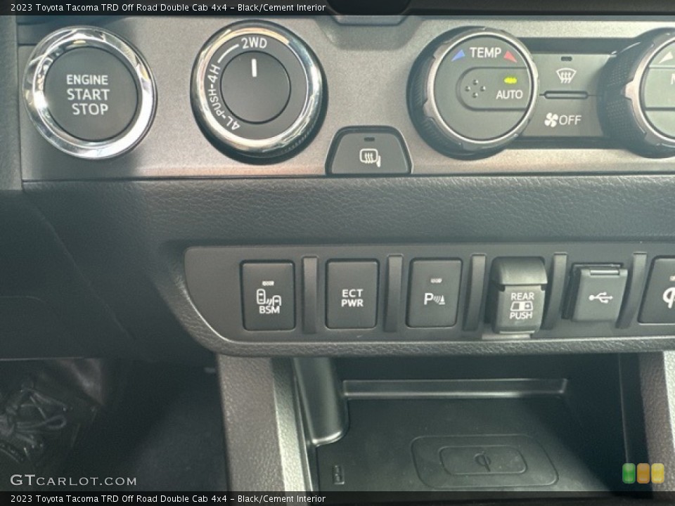 Black/Cement Interior Controls for the 2023 Toyota Tacoma TRD Off Road Double Cab 4x4 #146275475