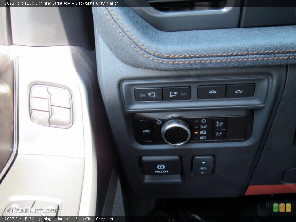 Black/Slate Gray Interior Controls for the 2023 Ford F150 Lightning Lariat 4x4 #146283034