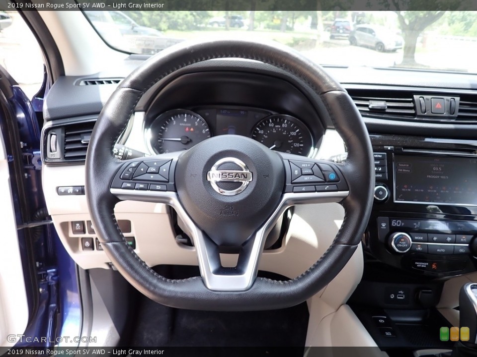 Light Gray Interior Steering Wheel for the 2019 Nissan Rogue Sport SV AWD #146294492