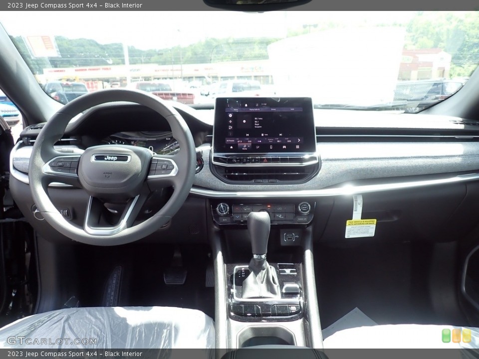 Black Interior Dashboard for the 2023 Jeep Compass Sport 4x4 #146317040