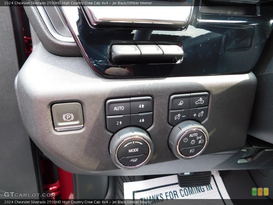Jet Black/Umber Interior Controls for the 2024 Chevrolet Silverado 2500HD High Country Crew Cab 4x4 #146343352