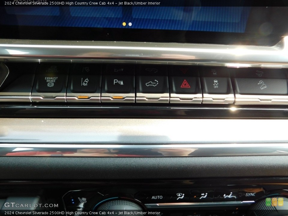 Jet Black/Umber Interior Controls for the 2024 Chevrolet Silverado 2500HD High Country Crew Cab 4x4 #146343664